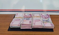 Kapkaççıyı bankanın güvenlik görevlisi yakalattı