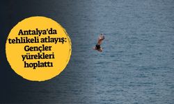 Antalya'da tehlikeli atlayış: Gençler yürekleri hoplattı