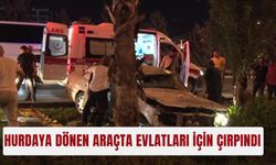 Hurdaya dönen araçta evlatları için çırpındı