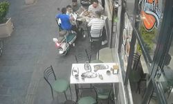 Elektrikli bisikletle yemek yiyenlerin arasına daldı