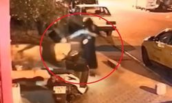 Patenle kayarak iş yeri kurşunladı: O anlar kamerada
