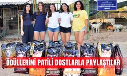 Kumluca’da ödüllerini patili dostlarla paylaştılar