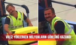 Valiz yüklerken milyonların gönlünü kazandı