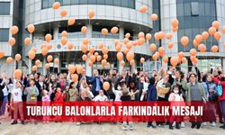 Turuncu balonlarla  farkındalık mesajı