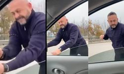 Meclis üyesini sıkıştırıp, aracı yumrukladı… O anlar kamerada