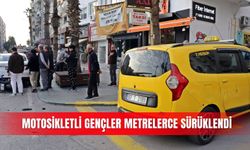 Motosikletli gençler metrelerce sürüklendi