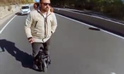 Sakar rampasında tek teker Scooter ile tehlikeli yolculuk