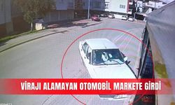 Virajı alamayan otomobil markete girdi