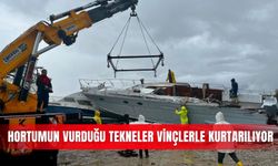 Hortumun vurduğu tekneler vinçlerle kurtarılıyor