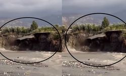 Aşırı yağışla birlikte yolda yaşanan çökme anı görüntülendi