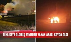 Tehlikeye aldırış etmeden yanan aracı kayda aldı