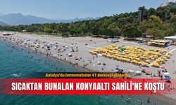 Antalya’da termometreler 41 dereceyi gösterdi!  Sıcaktan bunalan Konyaaltı Sahili'ne koştu