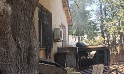 Eşine sinirlenip evi ateşe verdi