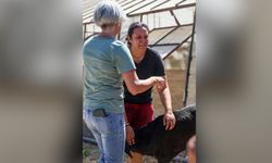 Alevlerin arasından kurtarılan malağına sarılıp, gözyaşı döktü
