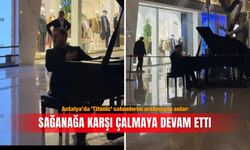 Antalya’da ’Titanic’ sahnelerini aratmayan anlar: Sağanağa karşı çalmaya devam etti
