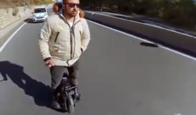 Sakar rampasında tek teker Scooter ile tehlikeli yolculuk