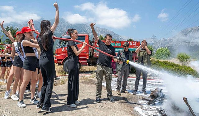 Kemer'de kraliçe adayları yangın söndürme eğitimi aldı