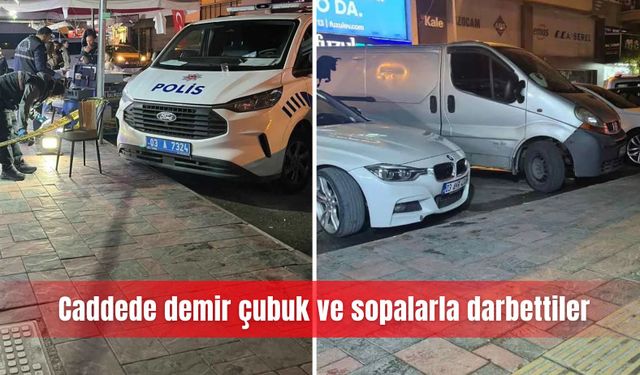 Caddede demir çubuk ve sopalarla darbettiler