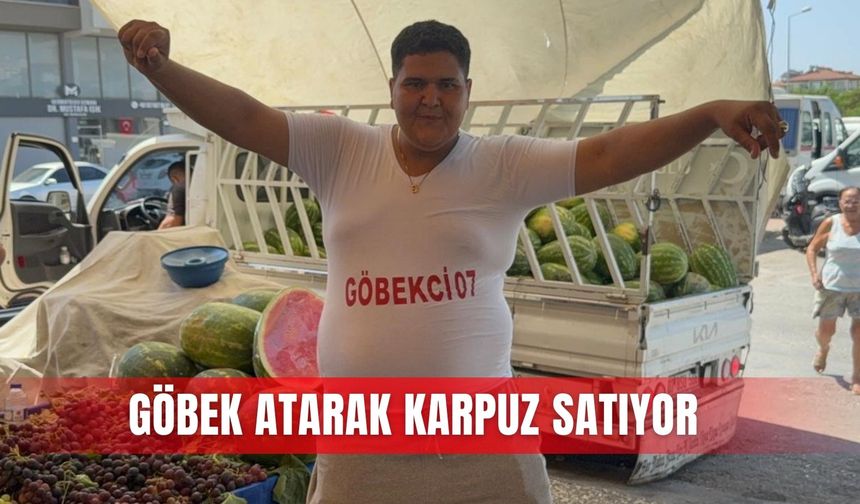 Göbek atarak karpuz satıyor