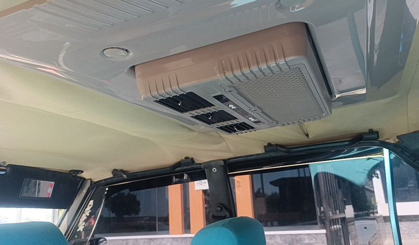 Sıcaktan bunaldı, 1988 model Kartal'a otobüs kliması taktırdı