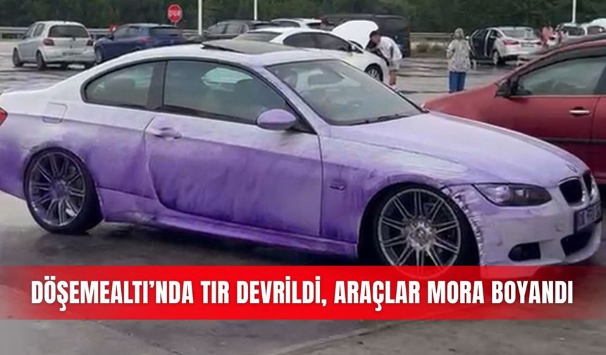 Döşemealtı’nda TIR devrildi, araçlar mora boyandı