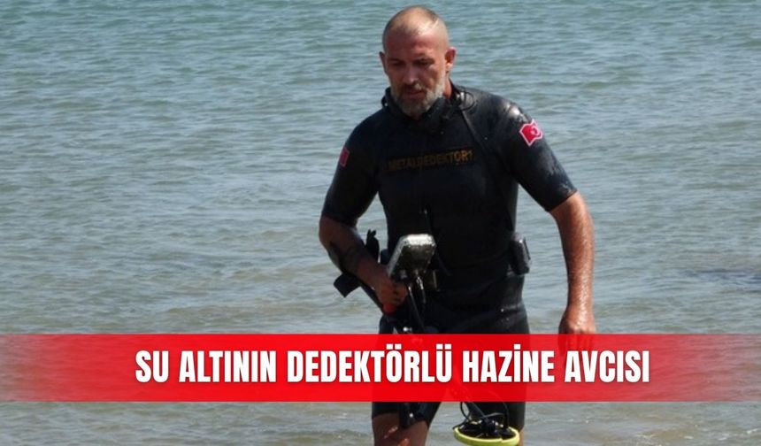 Su altının dedektörlü hazine avcısı